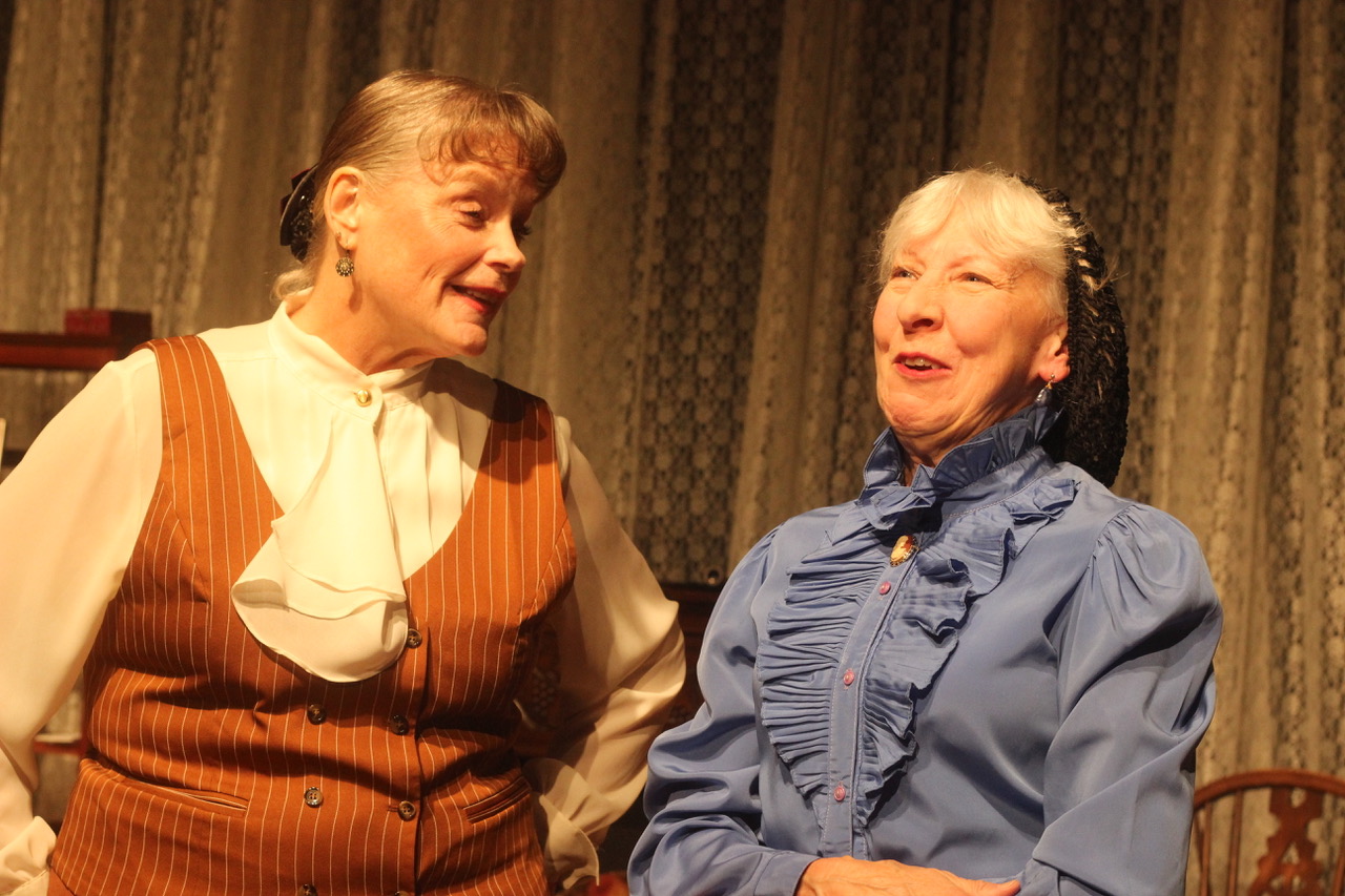 Mama (Maria Kelly). right, with Uncle Chris (Mary Aufman).